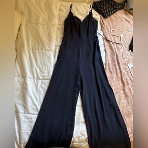 Forever 21 size medium jumpsuit. Chiffon material. Navy blue. Slits in legs.